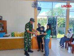 Babinsa Koramil 1314-02/Atinggola Dampingi Kegiatan Posyandu di Desa Bohusami
