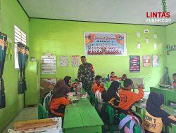 Babinsa Koramil 1314-01/Kwandang Dampingi Pendistribusian Makan Bergizi untuk Pelajar